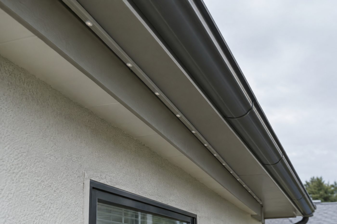 Permanent lighting track blended into the roofline in daylight