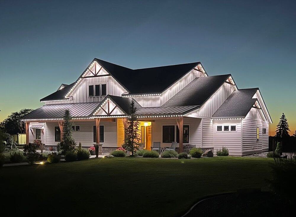 Home with permanent lighting at dusk