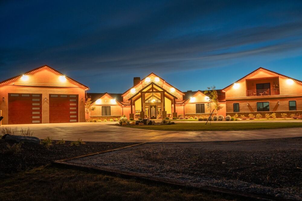 Lodge-style home at dusk
